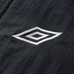 The SS26 Eyes Tracksuit Carbon Black available online with global shipping, and in PAM Stores Melbourne and Sydney.