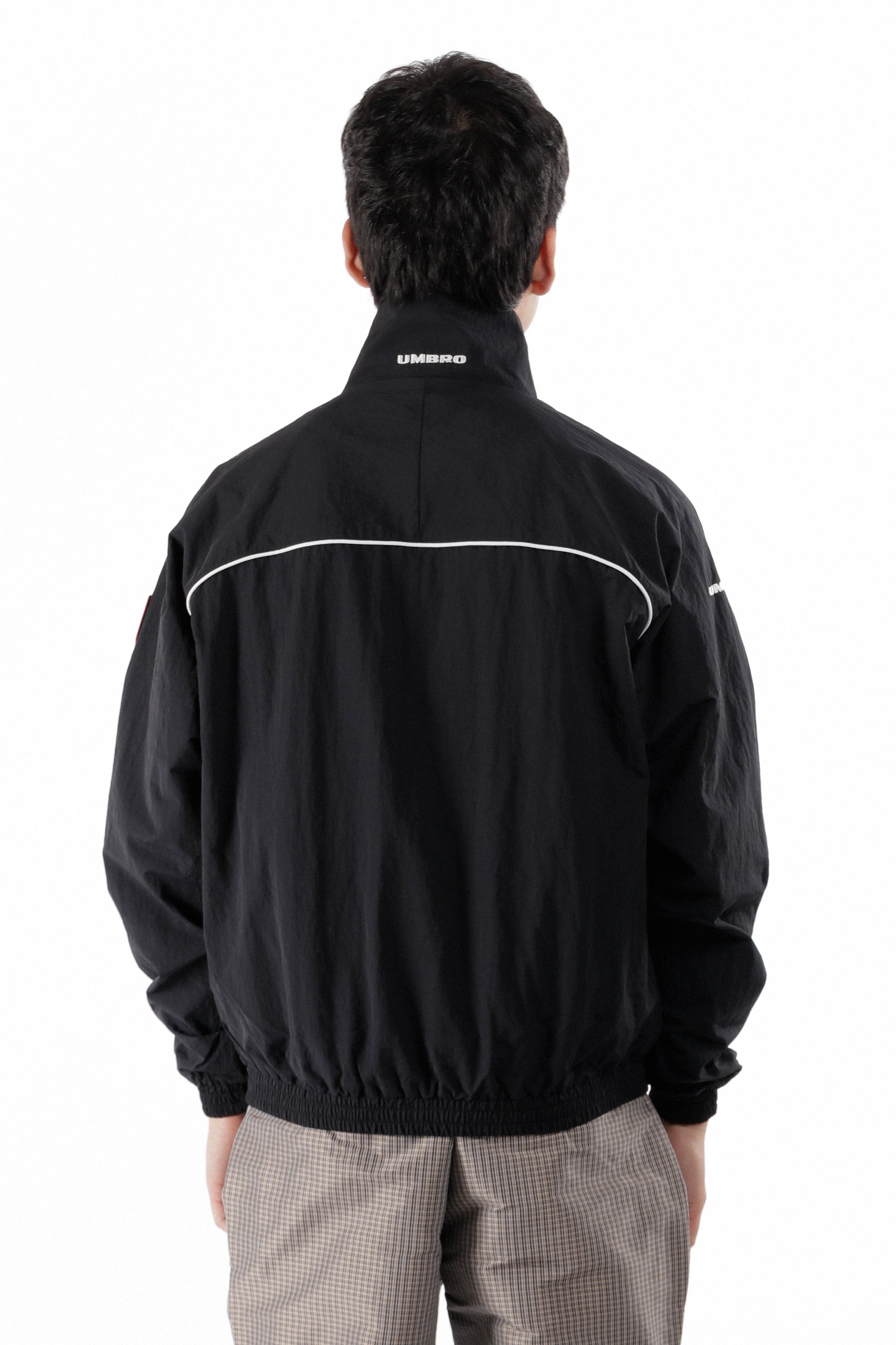 The Eyes Tracksuit Jacket Black available online with global shipping, and in PAM Stores Melbourne and Sydney.