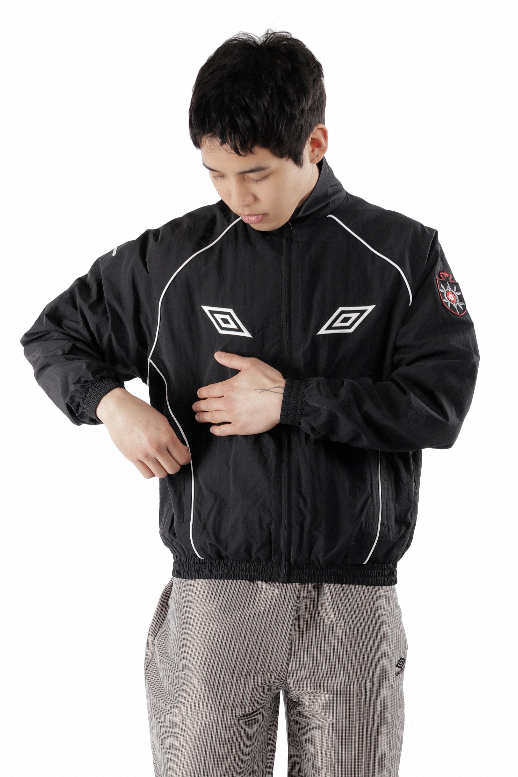 The Eyes Tracksuit Jacket Black available online with global shipping, and in PAM Stores Melbourne and Sydney.