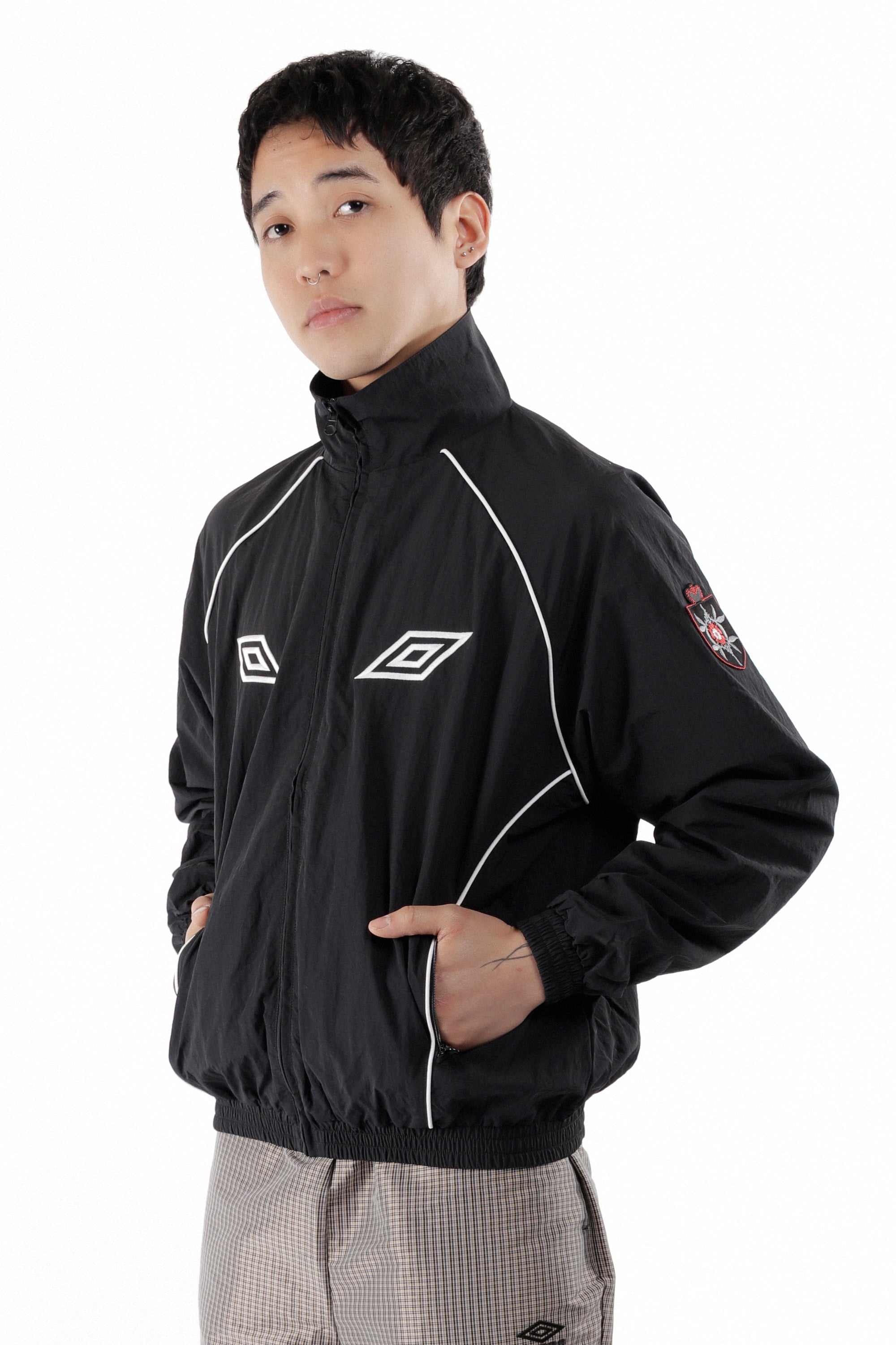 The Eyes Tracksuit Jacket Black available online with global shipping, and in PAM Stores Melbourne and Sydney.