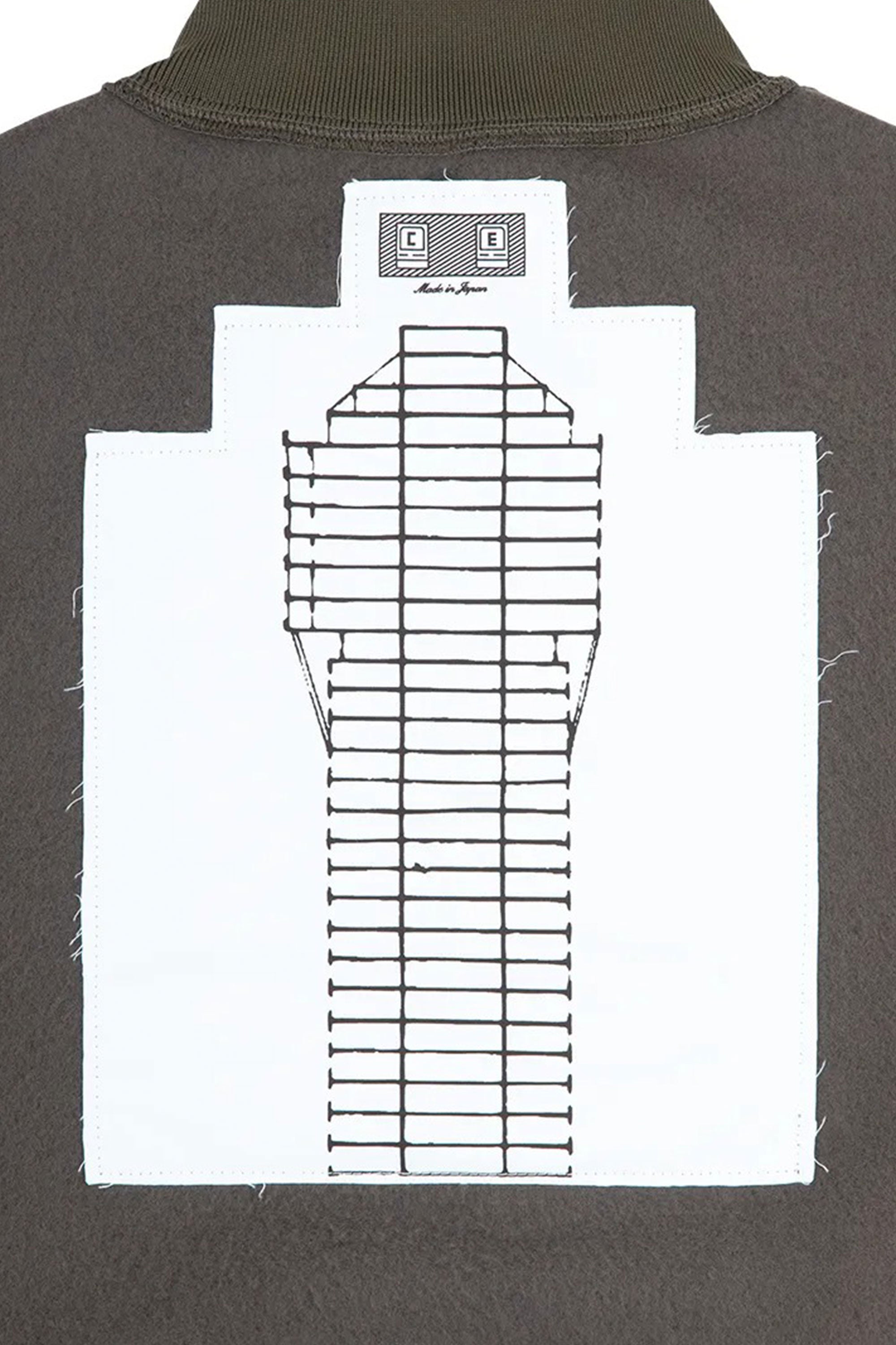 The FLEECE HALF ZIP UP KHAKI available online with global shipping, and in PAM Stores Melbourne and Sydney.