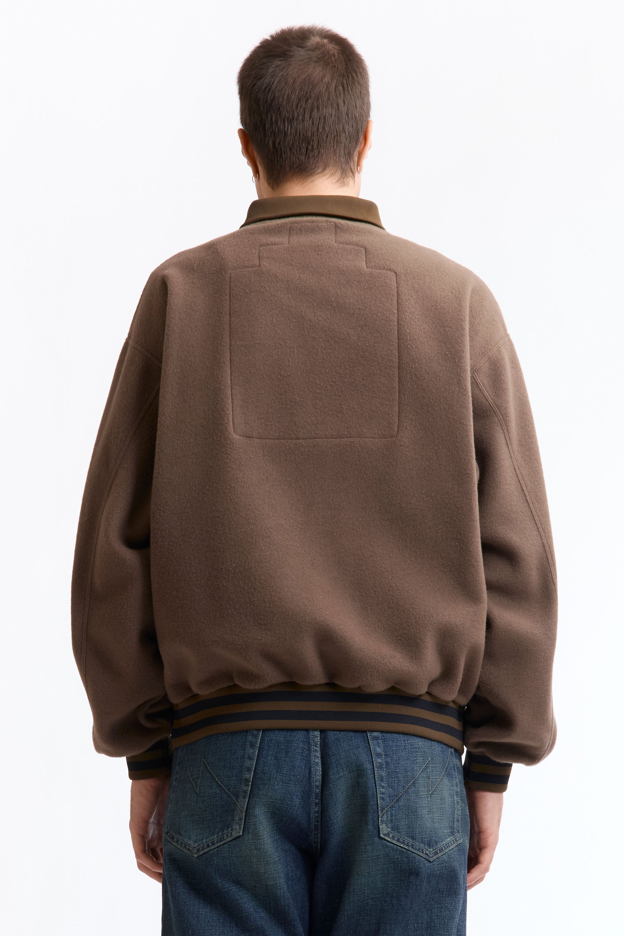 The FLEECE HALF ZIP UP KHAKI available online with global shipping, and in PAM Stores Melbourne and Sydney.