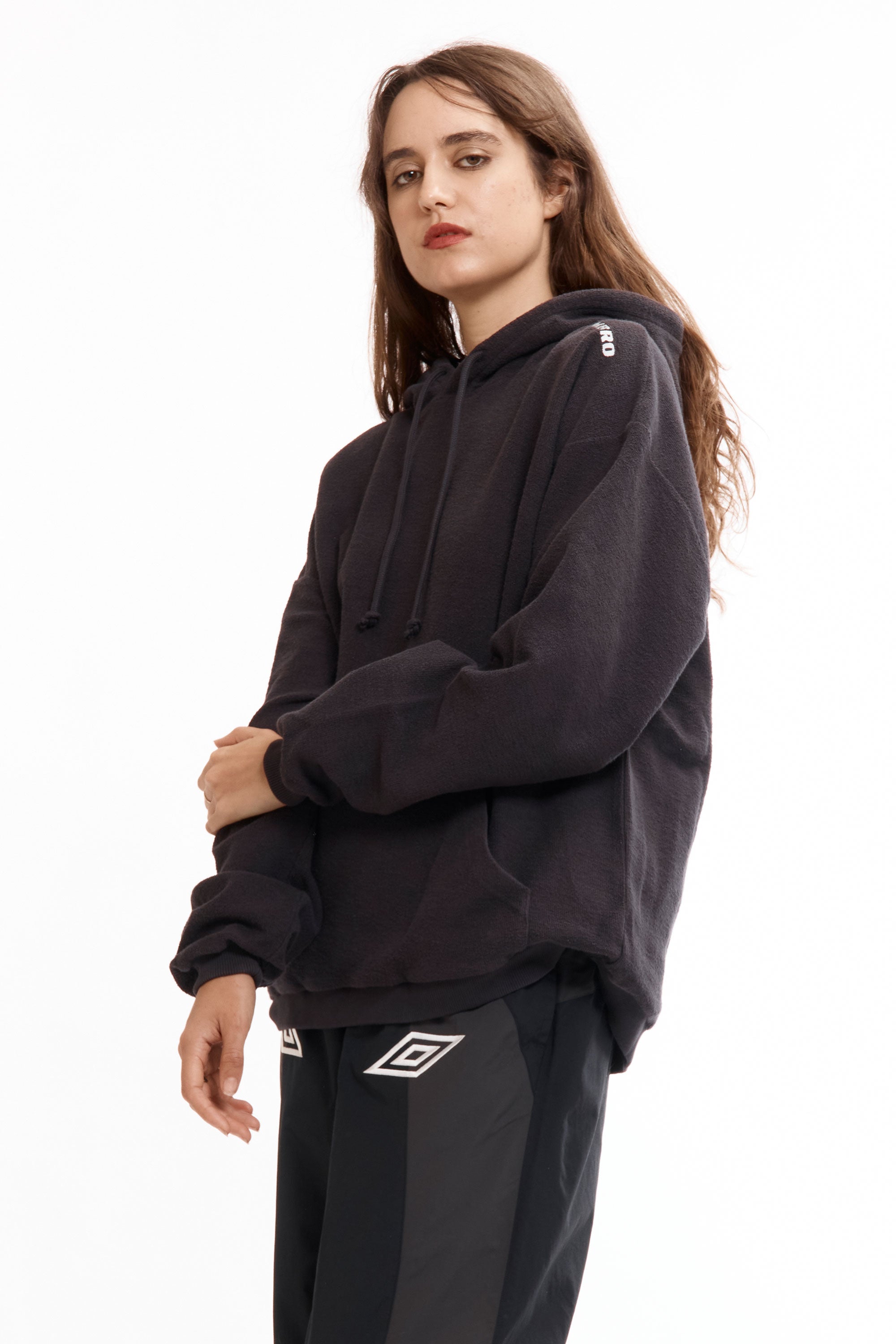 The SS26 Lasered Masked Hoodie Washed Black available online with global shipping, and in PAM Stores Melbourne and Sydney.