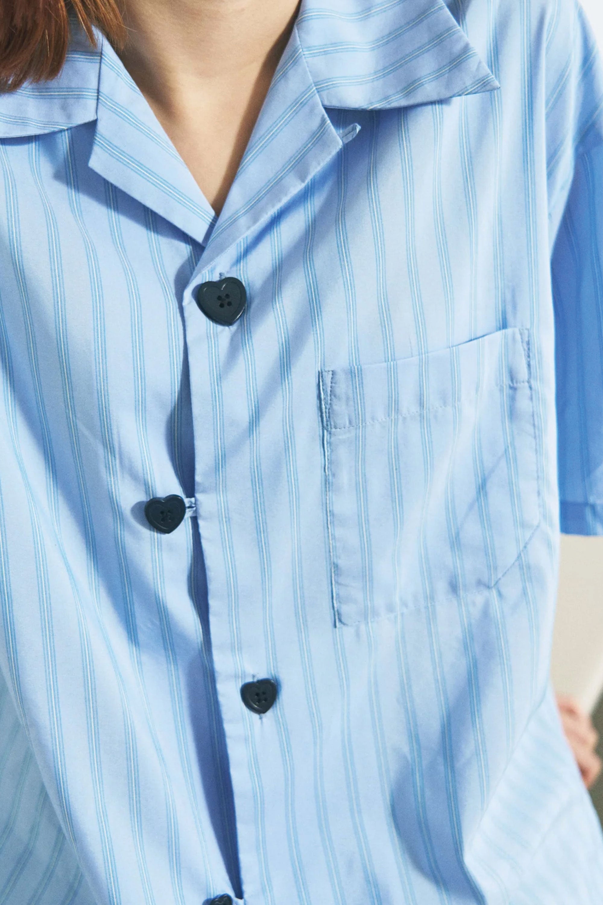 The FLOATING HEART SS SHIRT BLUE available online with global shipping, and in PAM Stores Melbourne and Sydney.