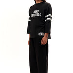 The FOOTBALL SHIRT LONGSLEEVE BLACK available online with global shipping, and in PAM Stores Melbourne and Sydney.