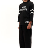 The FOOTBALL SHIRT LONGSLEEVE BLACK available online with global shipping, and in PAM Stores Melbourne and Sydney.