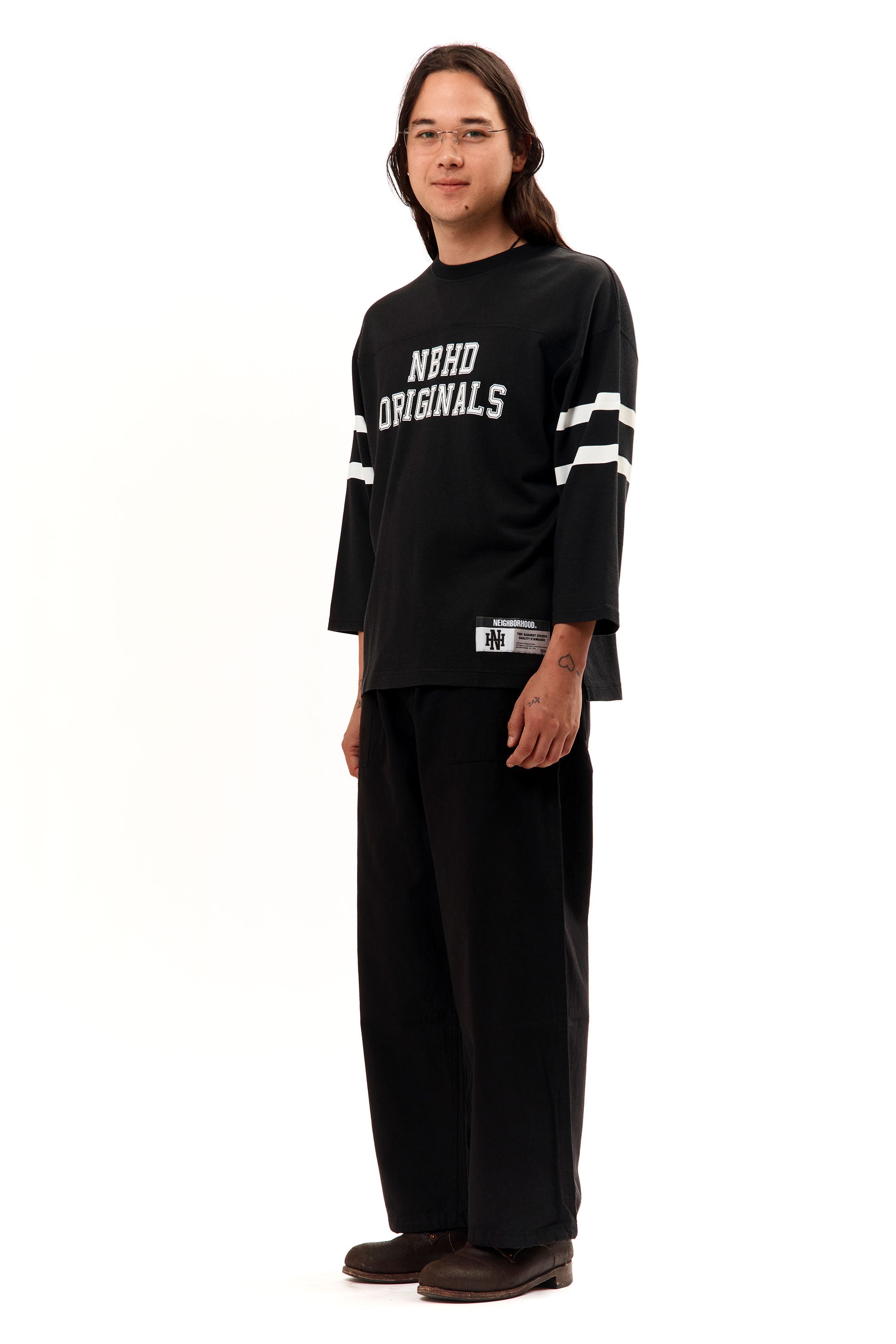 The FOOTBALL SHIRT LONGSLEEVE BLACK available online with global shipping, and in PAM Stores Melbourne and Sydney.