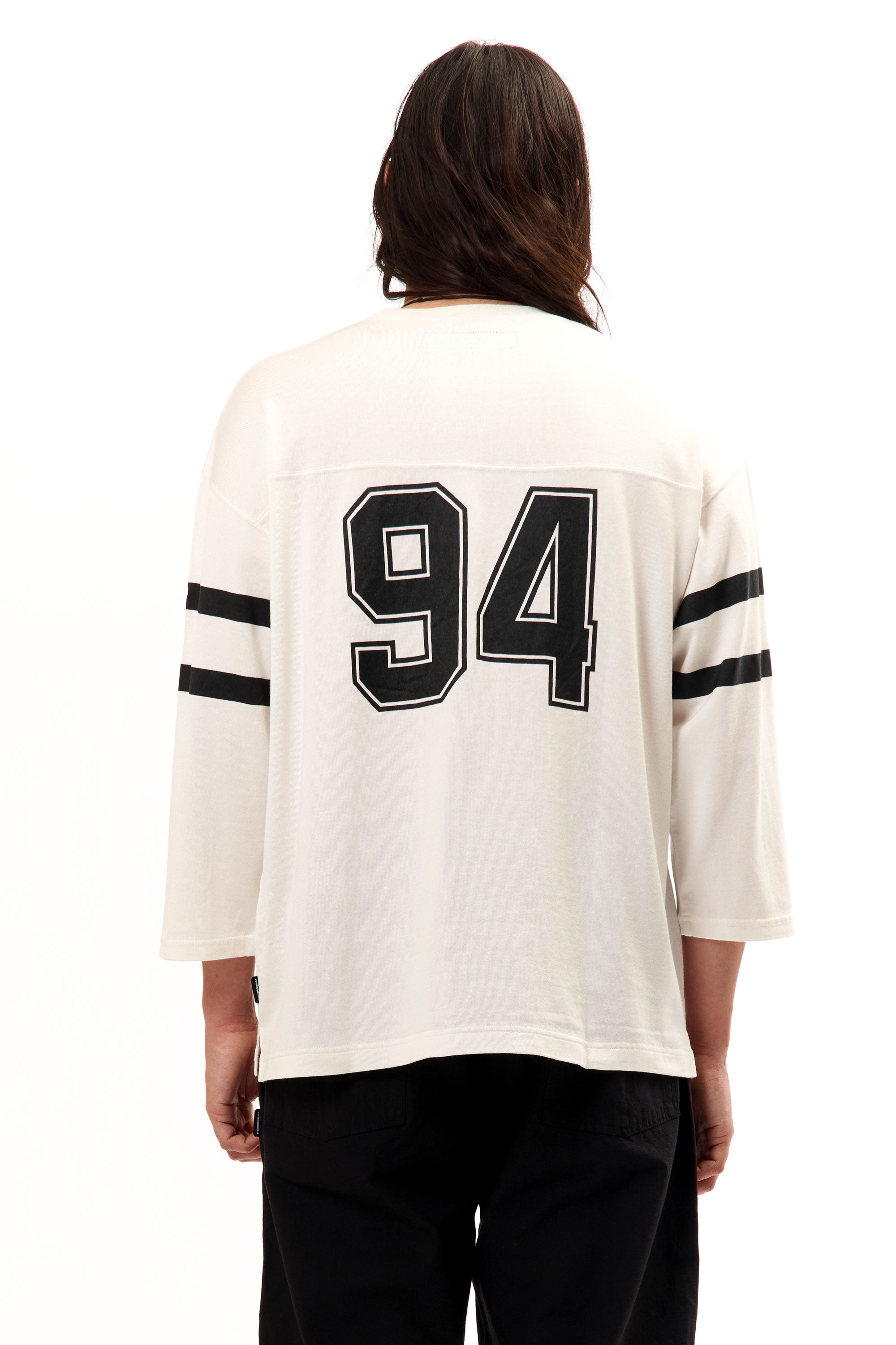 The FOOTBALL SHIRT LONGSLEEVE WHITE available online with global shipping, and in PAM Stores Melbourne and Sydney.