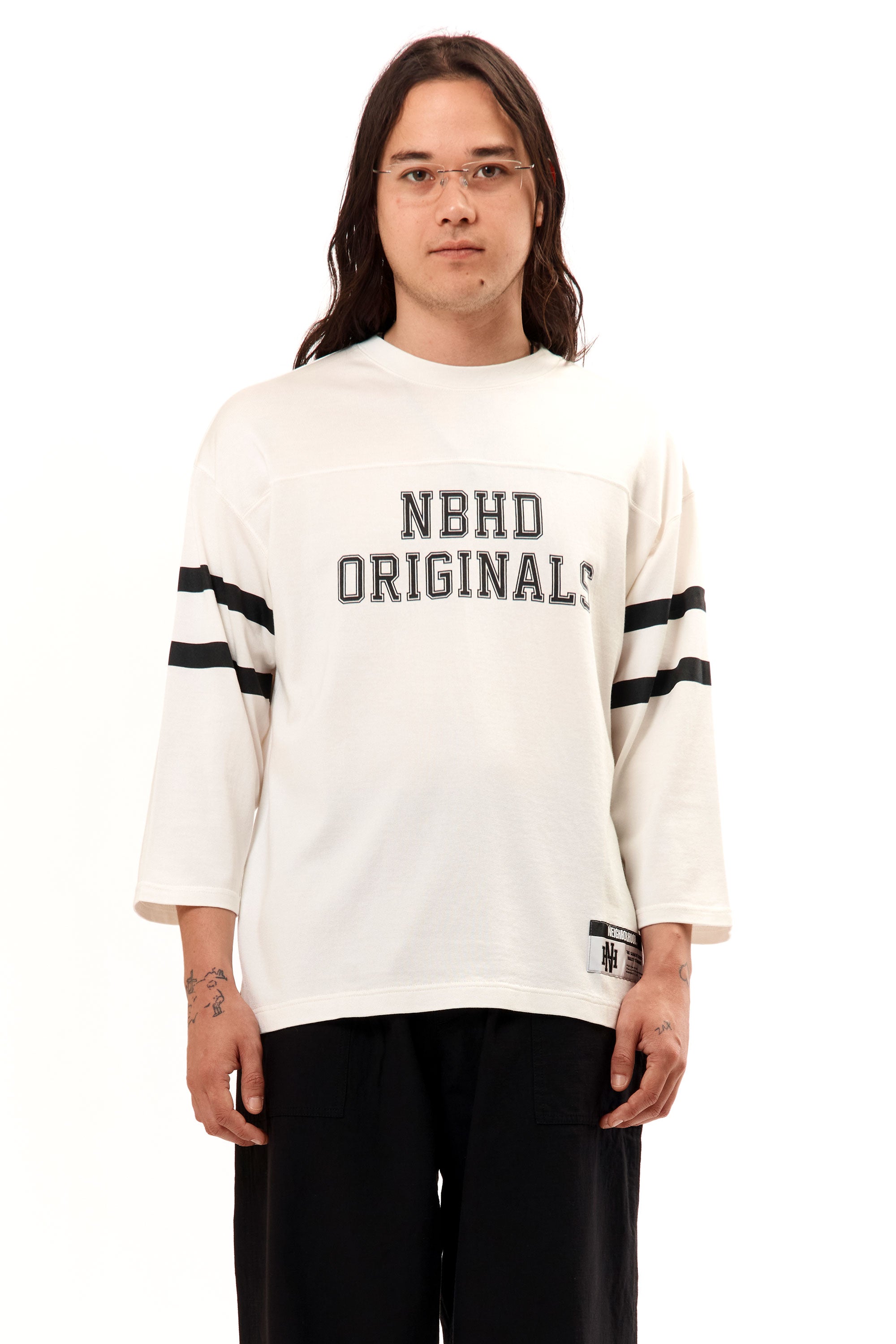 The FOOTBALL SHIRT LONGSLEEVE WHITE available online with global shipping, and in PAM Stores Melbourne and Sydney.