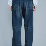 The WASHED DENIM FULL CUT PANTS INDIGO available online with global shipping, and in PAM Stores Melbourne and Sydney.