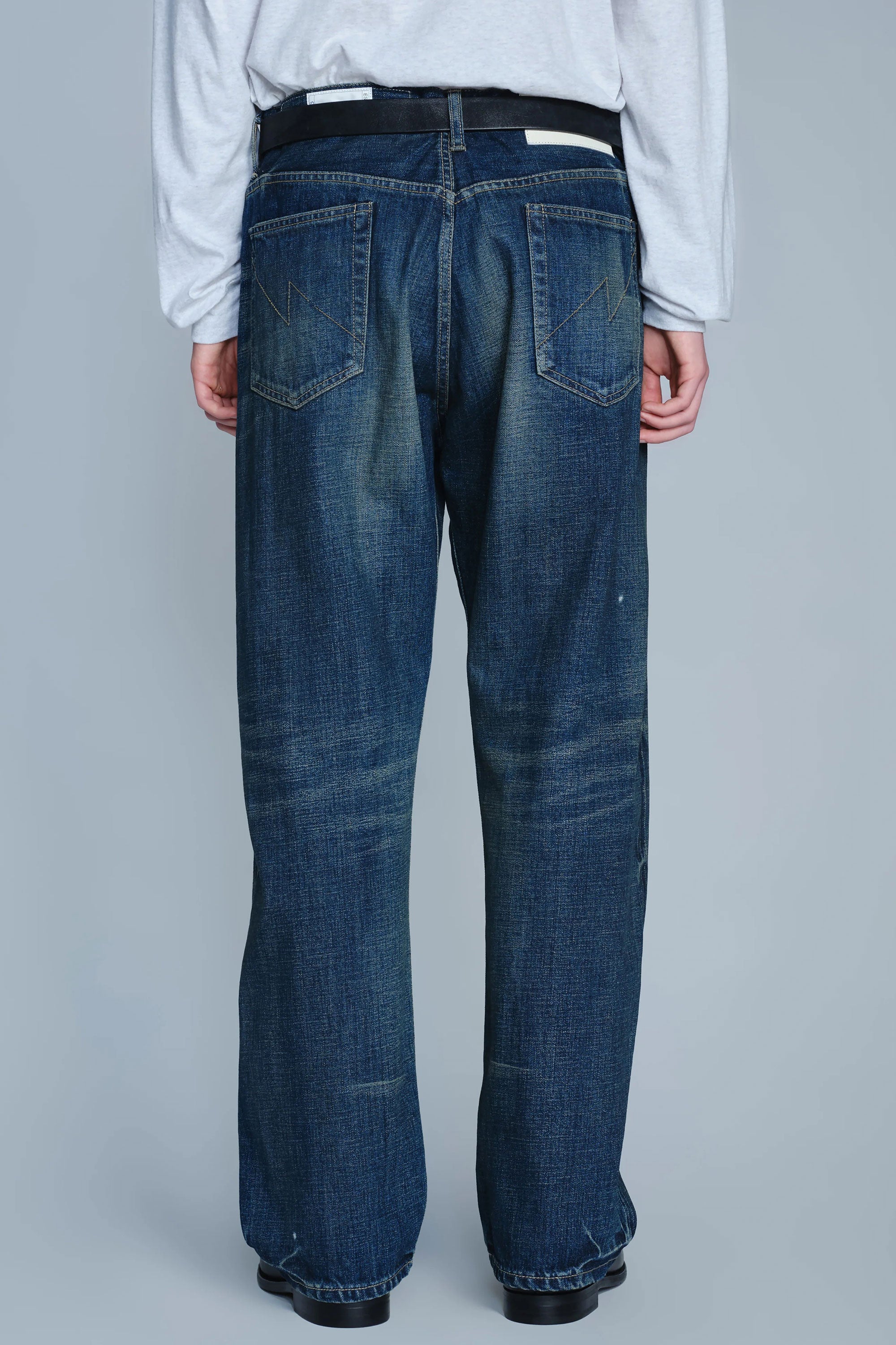 The WASHED DENIM FULL CUT PANTS INDIGO available online with global shipping, and in PAM Stores Melbourne and Sydney.