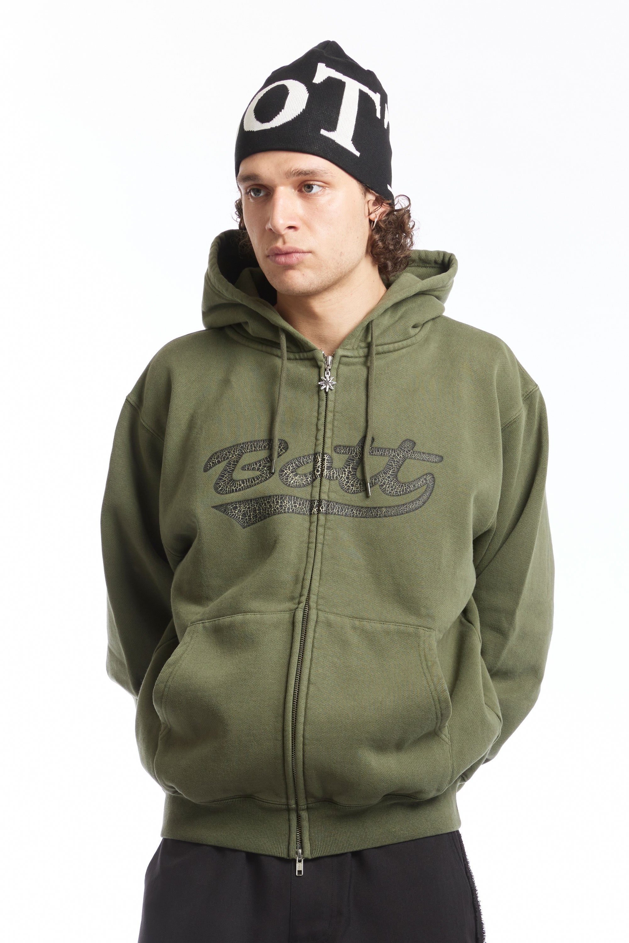 The Washed Script Logo Zip Hoodie Washed Olive available online with global shipping, and in PAM Stores Melbourne and Sydney.