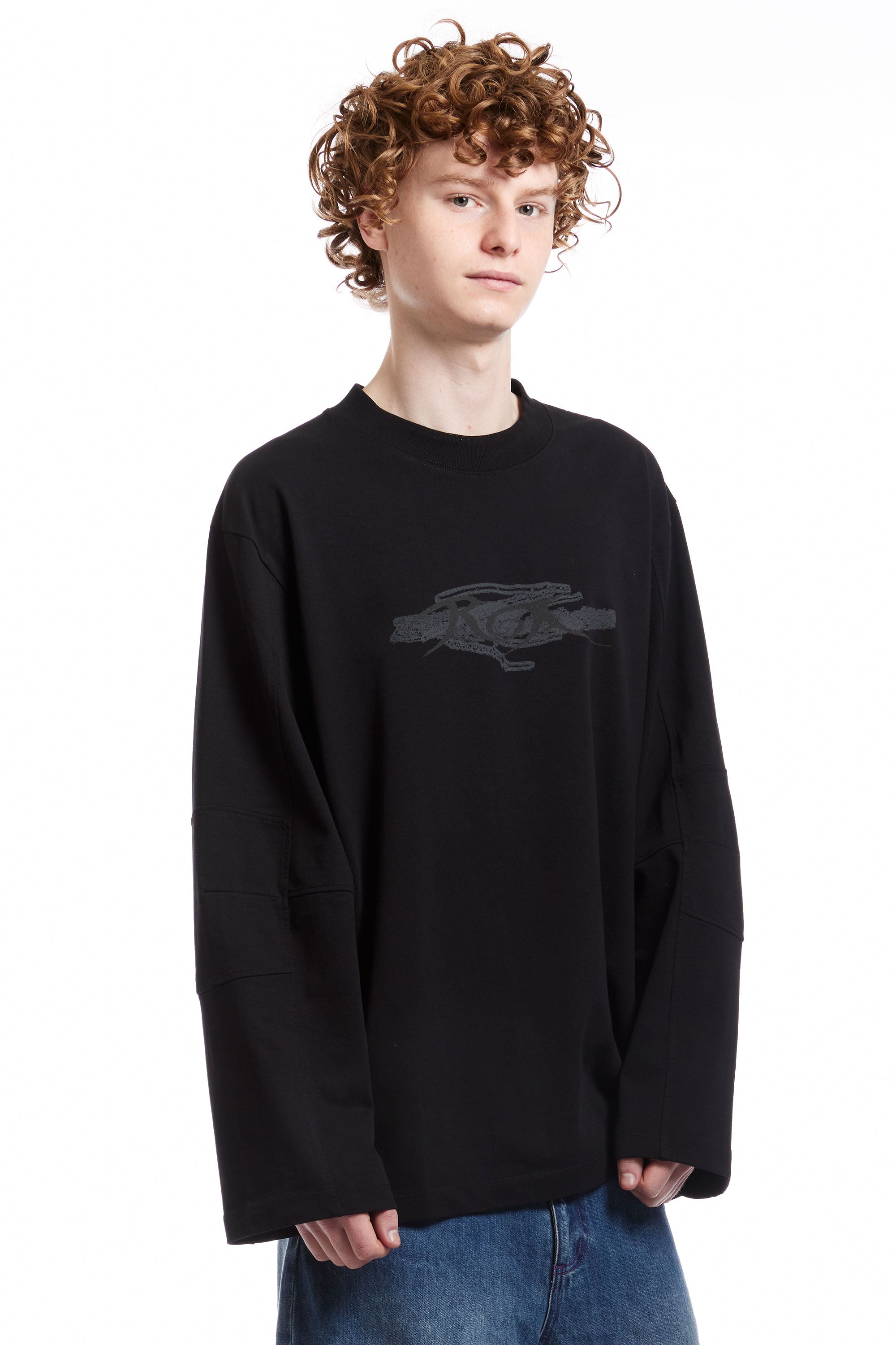 The LONG SLEEVE GRAPHIC TEE BLACK  available online with global shipping, and in PAM Stores Melbourne and Sydney.