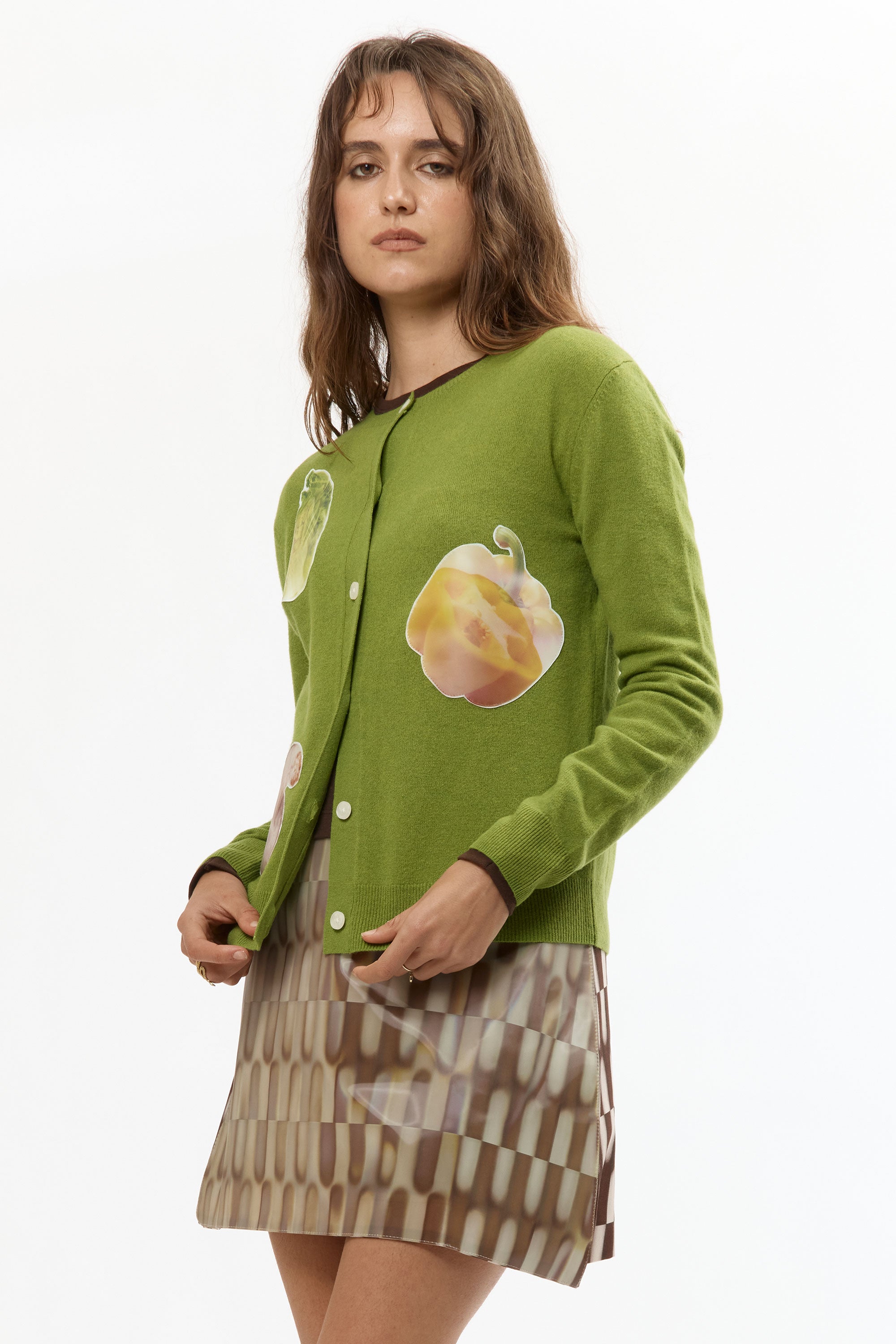 The VEGGIE PATCHWORK GREEN CARDIGAN available online with global shipping, and in PAM Stores Melbourne and Sydney.