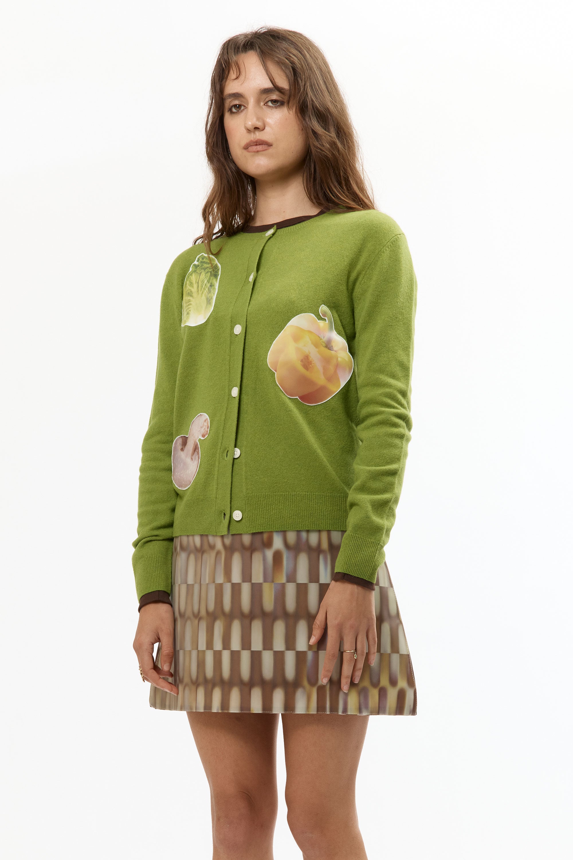 The VEGGIE PATCHWORK GREEN CARDIGAN available online with global shipping, and in PAM Stores Melbourne and Sydney.
