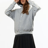 The VISOR BUTTON HOODIE HEATHER GREY available online with global shipping, and in PAM Stores Melbourne and Sydney.