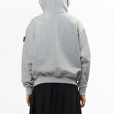 The VISOR BUTTON HOODIE HEATHER GREY available online with global shipping, and in PAM Stores Melbourne and Sydney.
