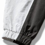 The Guarding Masked Tracksuit White Dark Olive available online with global shipping, and in PAM Stores Melbourne and Sydney.