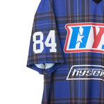 The GUITAR GIRL 84 FOOTBALL SHIRT available online with global shipping, and in PAM Stores Melbourne and Sydney.