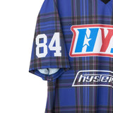 The GUITAR GIRL 84 FOOTBALL SHIRT available online with global shipping, and in PAM Stores Melbourne and Sydney.