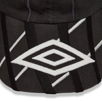 The SS26 Goalkeeper Cap Dark Grey available online with global shipping, and in PAM Stores Melbourne and Sydney.