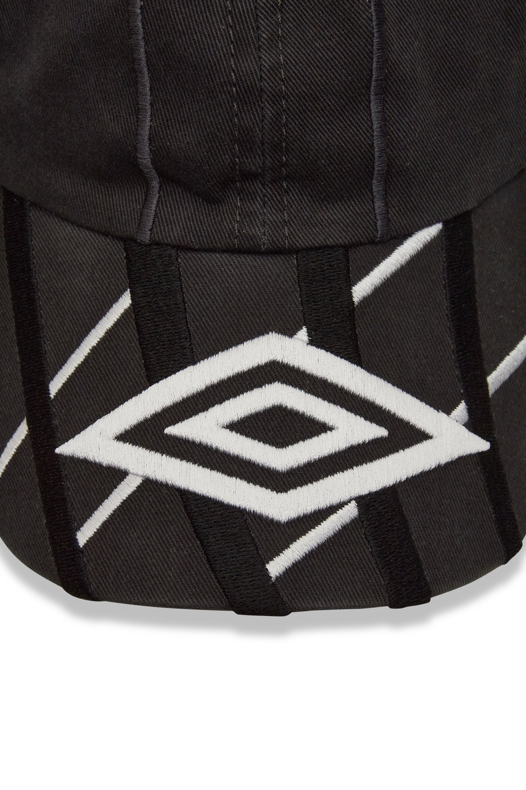 The SS26 Goalkeeper Cap Dark Grey available online with global shipping, and in PAM Stores Melbourne and Sydney.