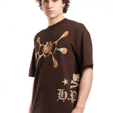 The H.P.F.C. Angel T-Shirt Brown  available online with global shipping, and in PAM Stores Melbourne and Sydney.