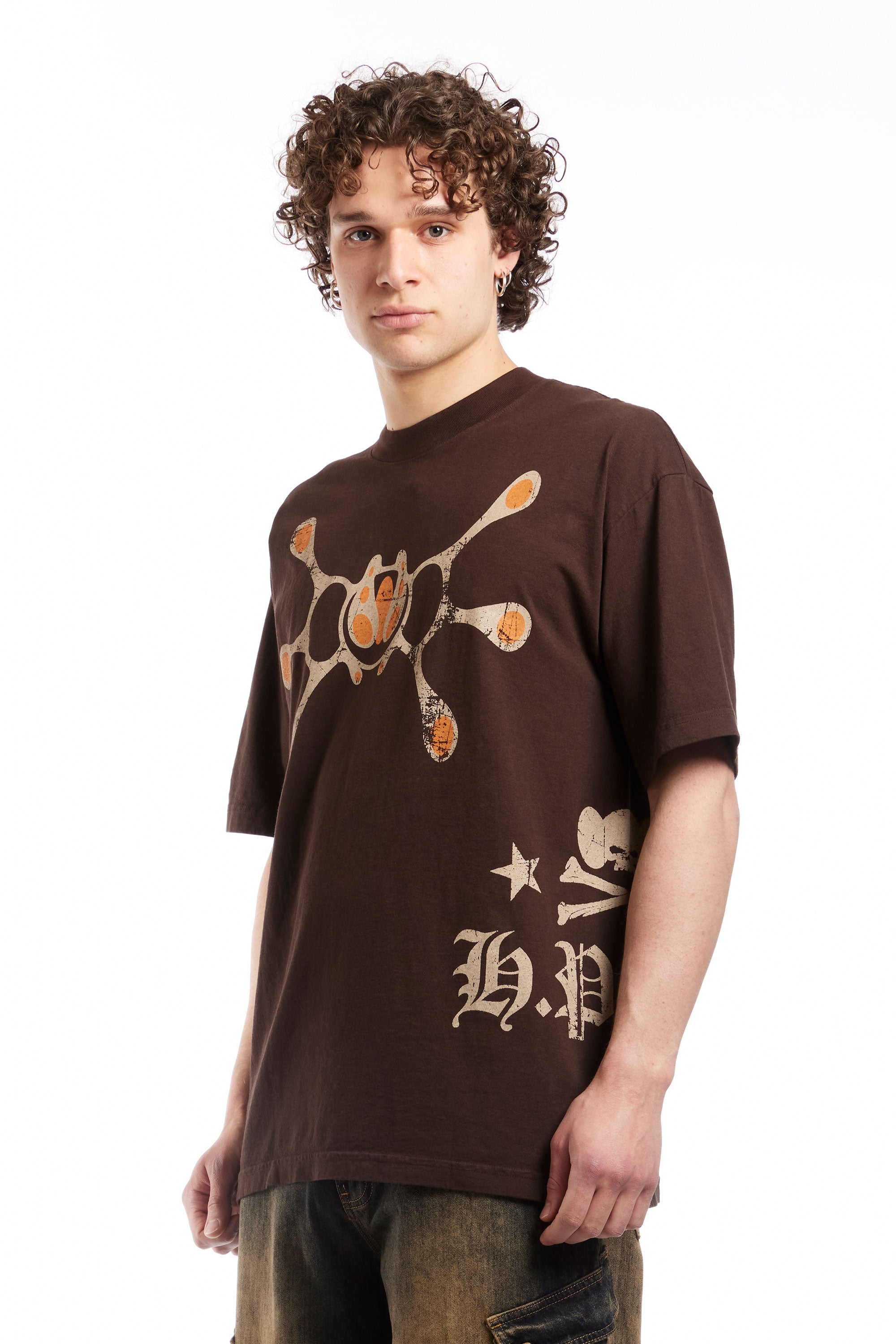 The H.P.F.C. Angel T-Shirt Brown  available online with global shipping, and in PAM Stores Melbourne and Sydney.