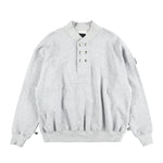 The DOUBLE HENLEY SWEATSHIRT GREY available online with global shipping, and in PAM Stores Melbourne and Sydney.