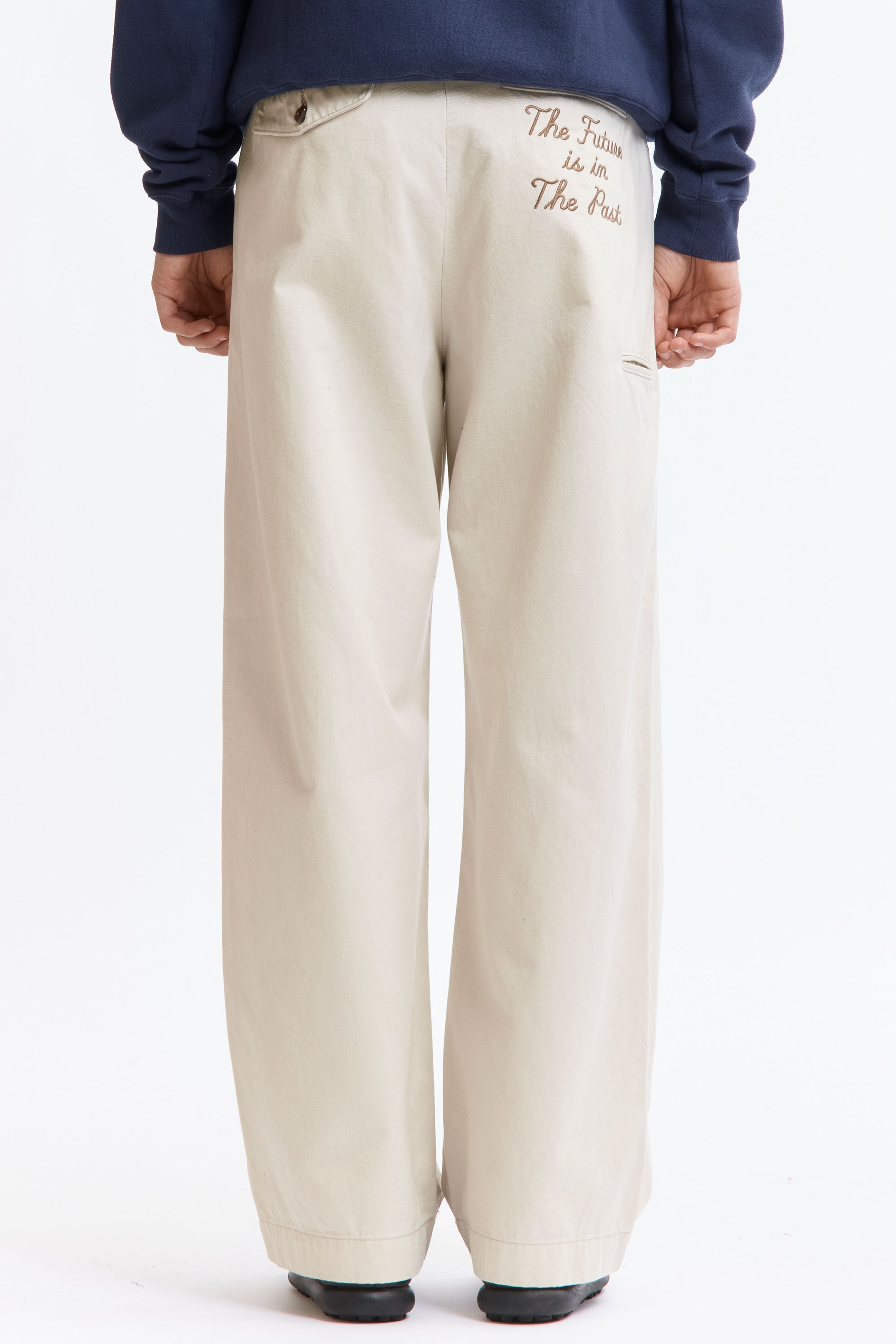The WIDE CHINO PANTS WHITE available online with global shipping, and in PAM Stores Melbourne and Sydney.