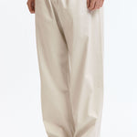 The WIDE CHINO PANTS WHITE available online with global shipping, and in PAM Stores Melbourne and Sydney.