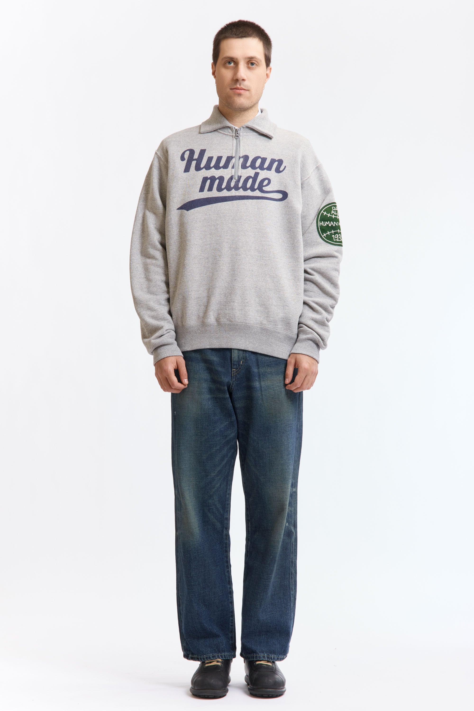 The HALF-ZIP SWEATSHIRT GREY available online with global shipping, and in PAM Stores Melbourne and Sydney.