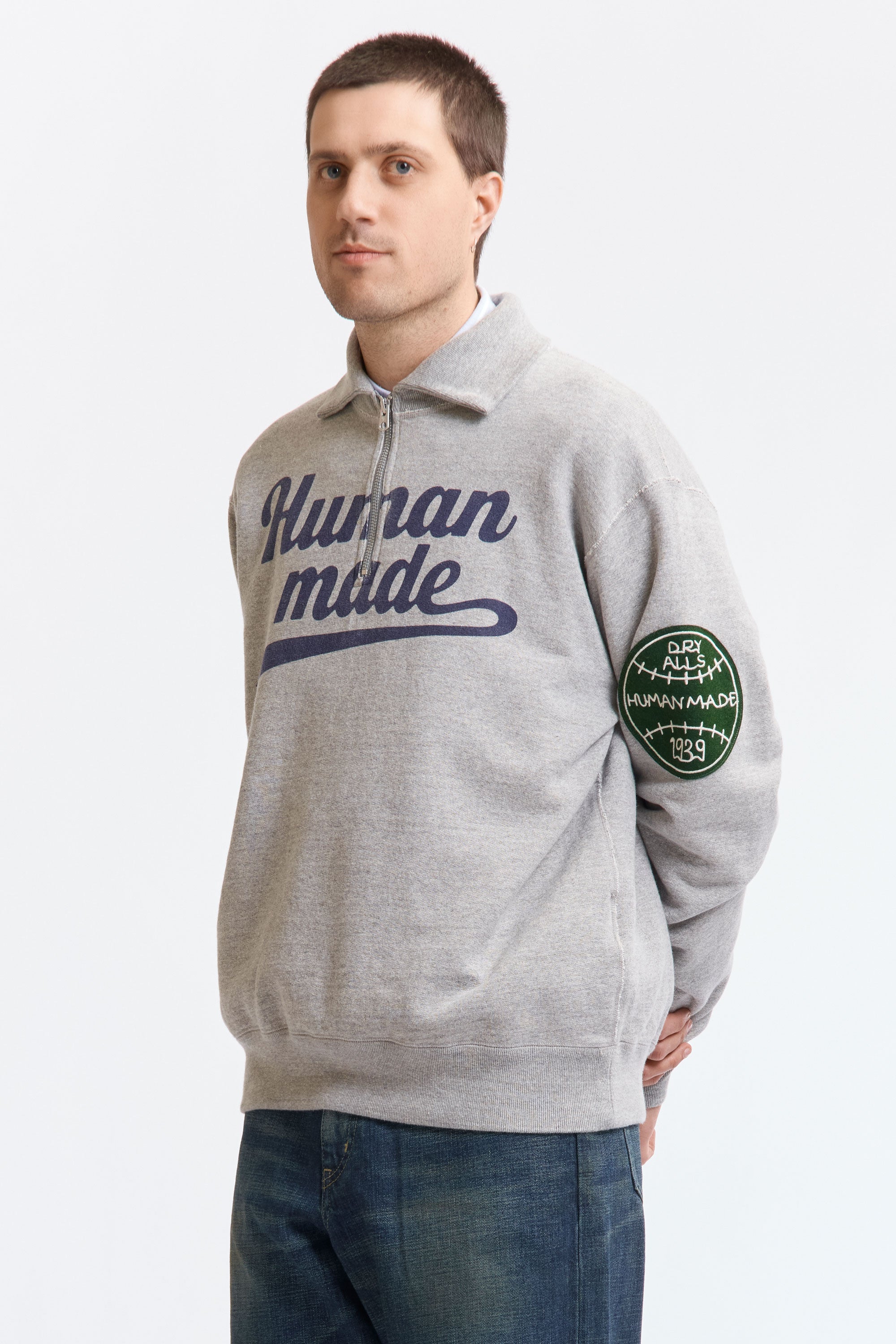 The HALF-ZIP SWEATSHIRT GREY available online with global shipping, and in PAM Stores Melbourne and Sydney.