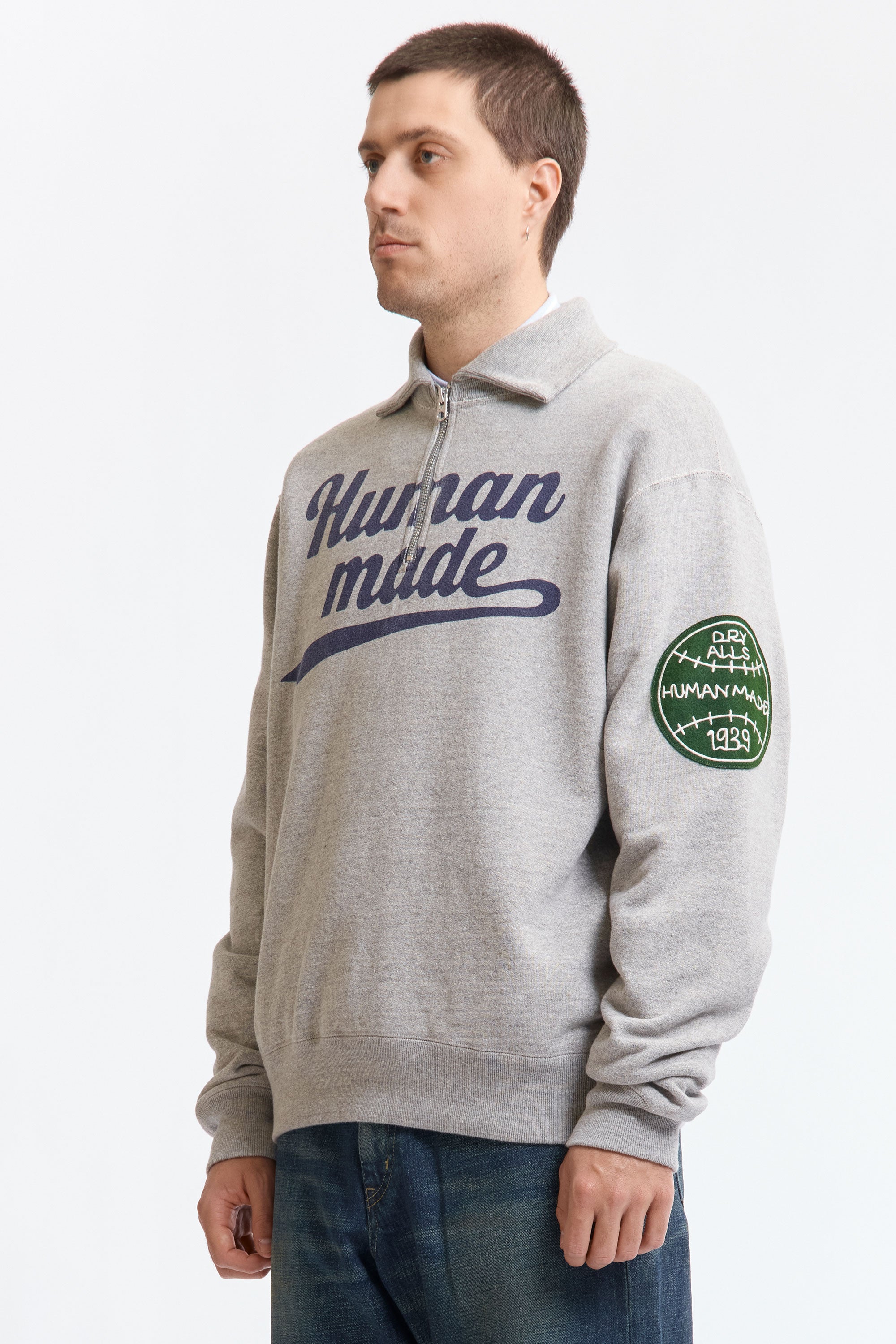 The HALF-ZIP SWEATSHIRT GREY available online with global shipping, and in PAM Stores Melbourne and Sydney.