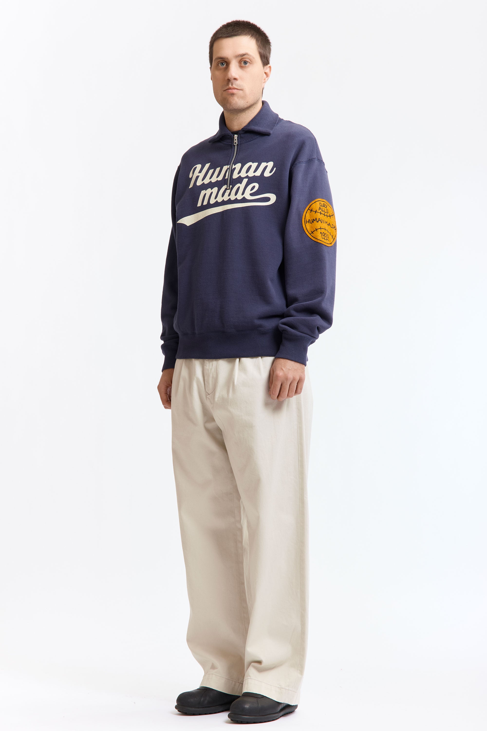 The HALF-ZIP SWEATSHIRT NAVY available online with global shipping, and in PAM Stores Melbourne and Sydney.