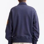 The HALF-ZIP SWEATSHIRT NAVY available online with global shipping, and in PAM Stores Melbourne and Sydney.