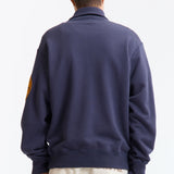 The HALF-ZIP SWEATSHIRT NAVY available online with global shipping, and in PAM Stores Melbourne and Sydney.