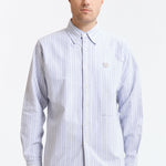 The STRIPE OX B.D SHIRT BLUE available online with global shipping, and in PAM Stores Melbourne and Sydney.