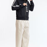 The TRACK JACKET BLACK available online with global shipping, and in PAM Stores Melbourne and Sydney.