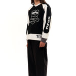 The HOCKEY SHIRT LONGSLEEVE BLACK available online with global shipping, and in PAM Stores Melbourne and Sydney.