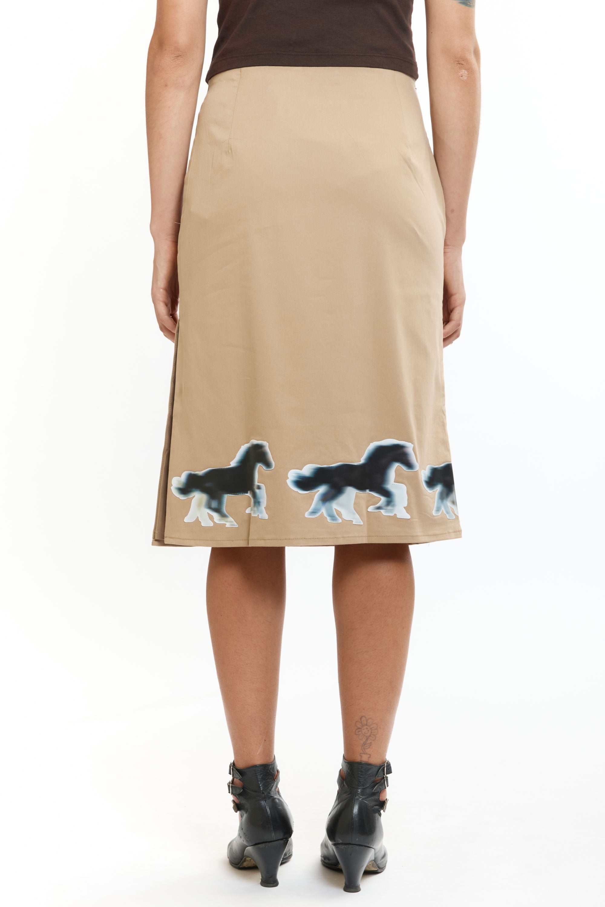 The Lenticular Running Horses Mini Skirt available online with global shipping, and in PAM Stores Melbourne and Sydney.