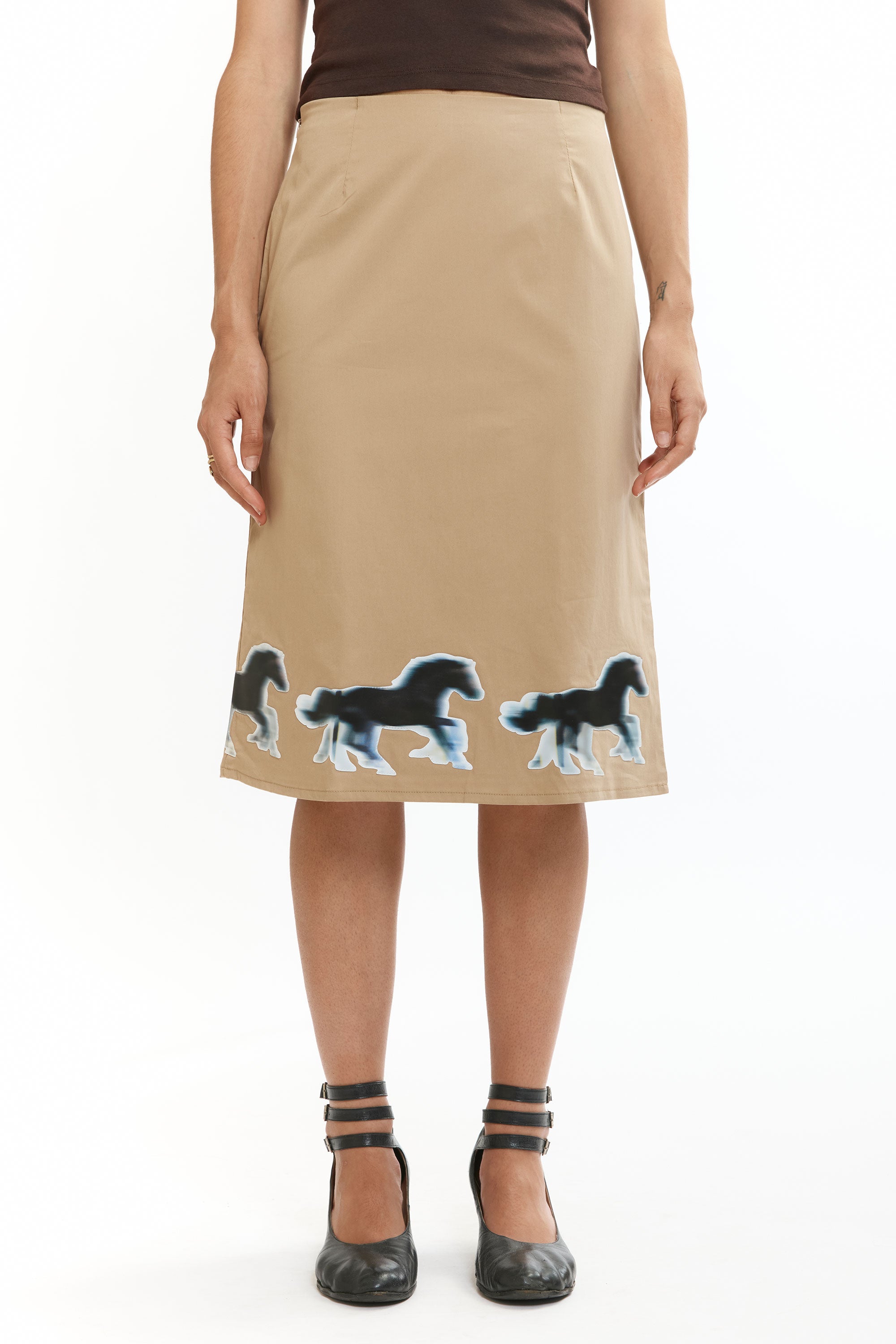The Lenticular Running Horses Mini Skirt available online with global shipping, and in PAM Stores Melbourne and Sydney.