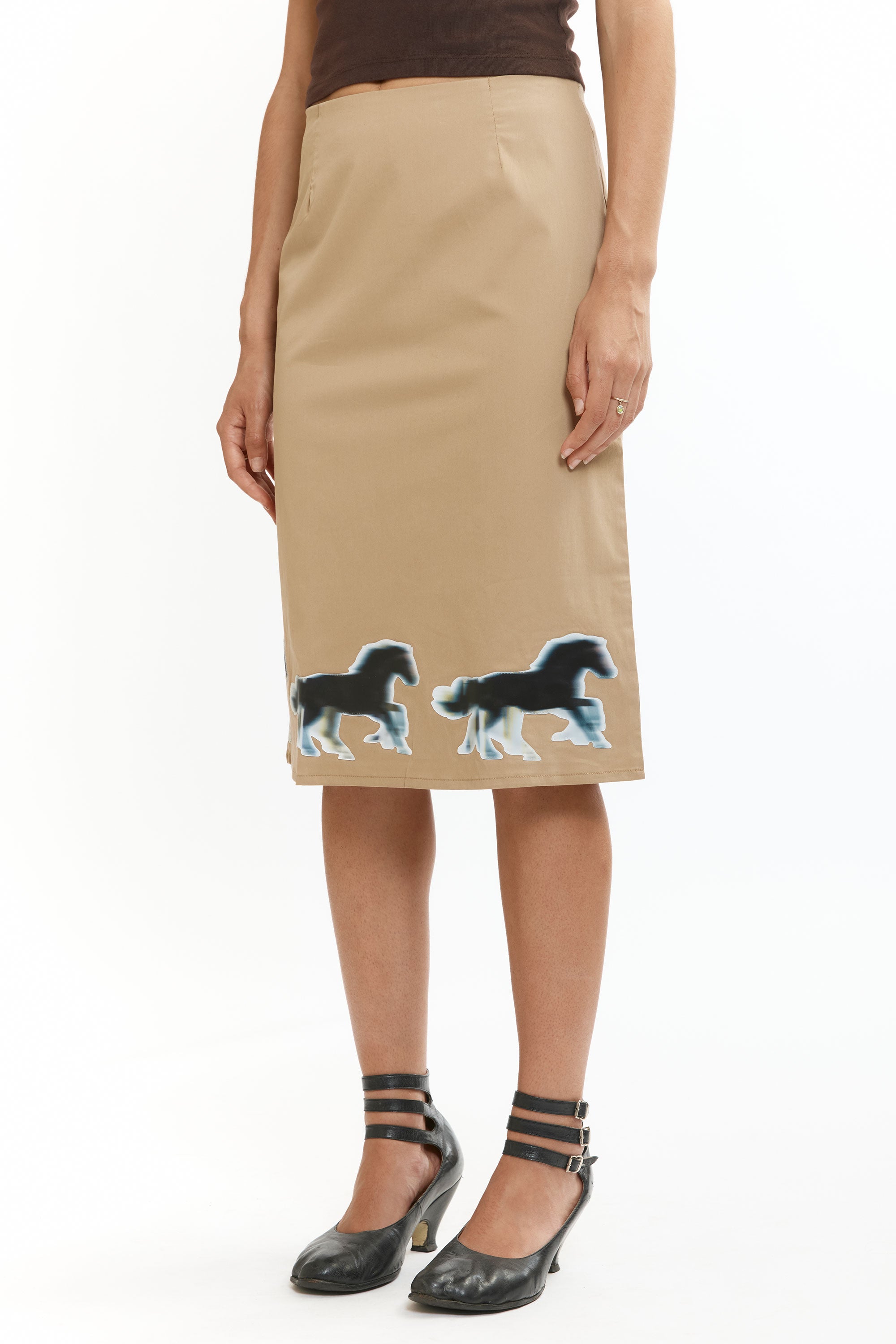 The Lenticular Running Horses Mini Skirt available online with global shipping, and in PAM Stores Melbourne and Sydney.