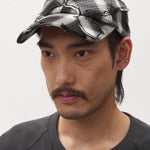 The CHECK ALIEN BUTTERFLY KISS BASEBALL CAP available online with global shipping, and in PAM Stores Melbourne and Sydney.