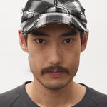 The CHECK ALIEN BUTTERFLY KISS BASEBALL CAP available online with global shipping, and in PAM Stores Melbourne and Sydney.