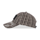 The SS26 Check Hazard Cap Beige Dark Brown available online with global shipping, and in PAM Stores Melbourne and Sydney.