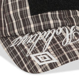 The SS26 Check Hazard Cap Beige Dark Brown available online with global shipping, and in PAM Stores Melbourne and Sydney.