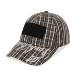 The SS26 Check Hazard Cap Beige Dark Brown available online with global shipping, and in PAM Stores Melbourne and Sydney.