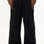 The ILLUSIONISTS PANTS OVERDYE BLACK available online with global shipping, and in PAM Stores Melbourne and Sydney.