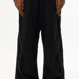 The ILLUSIONISTS PANTS OVERDYE BLACK available online with global shipping, and in PAM Stores Melbourne and Sydney.
